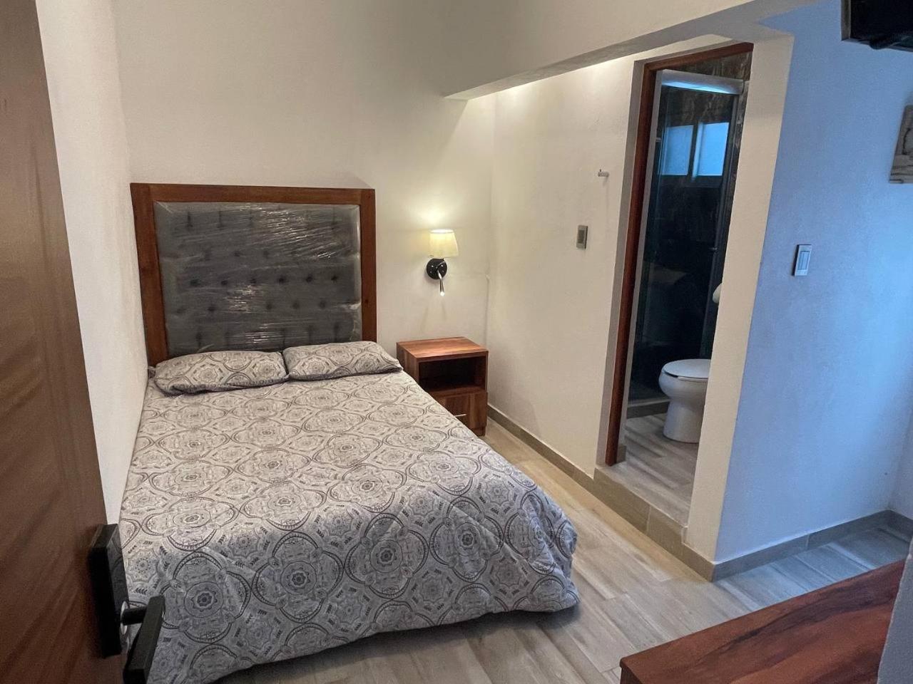 Suites C O V A D O N G A Mexico Chambre photo
